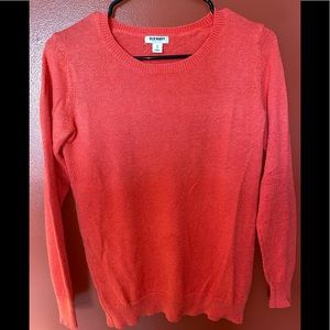 Woman’s red Old Navy long sleeve sweater